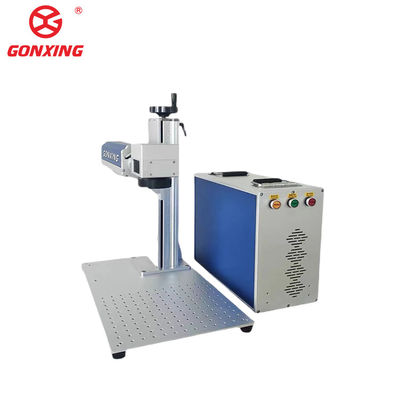 Lojas de vestuário beneficiam de uma máquina de impressão a laser de mesa de fibra 3D 2D com capacidade de refrigeração por água de 10 a 100%